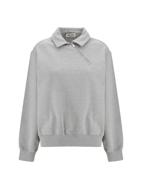Sweatshirt with oblique zip closure