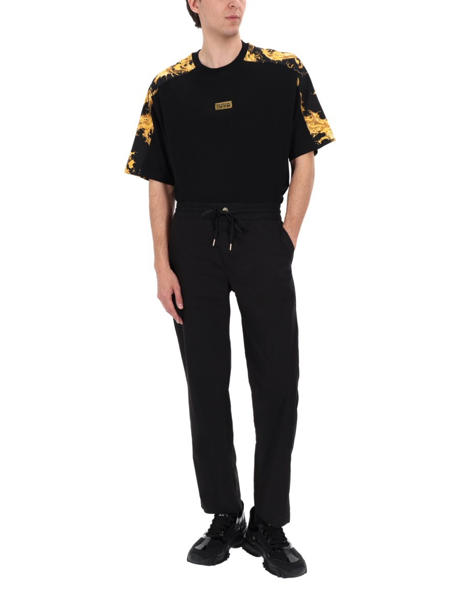 [VERSACE JEANS COUTURE] Trousers SS26 80GAA100_N0132899