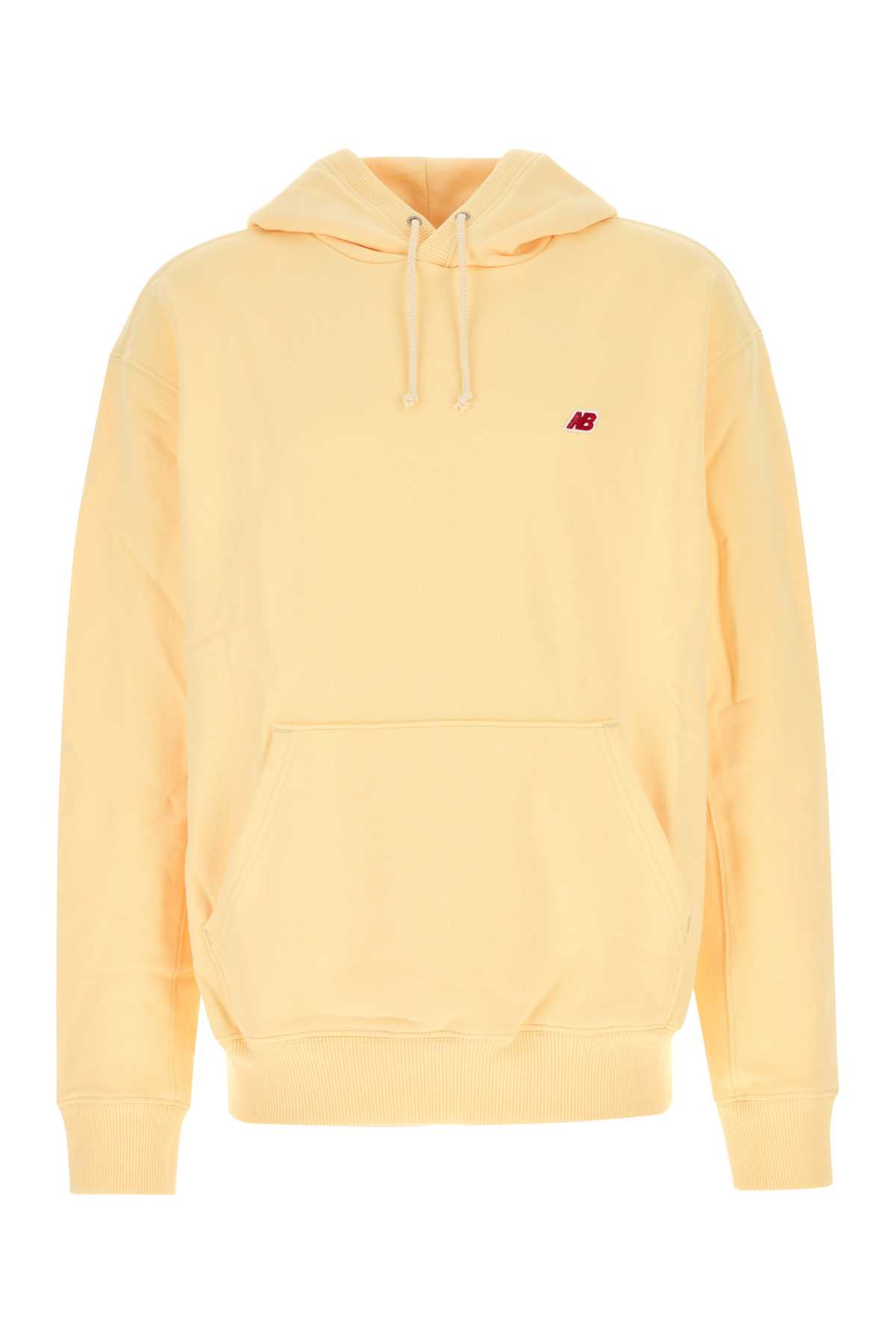 [NEW BALANCE] Hoodie FW25 MT43546CAU CALCIUM