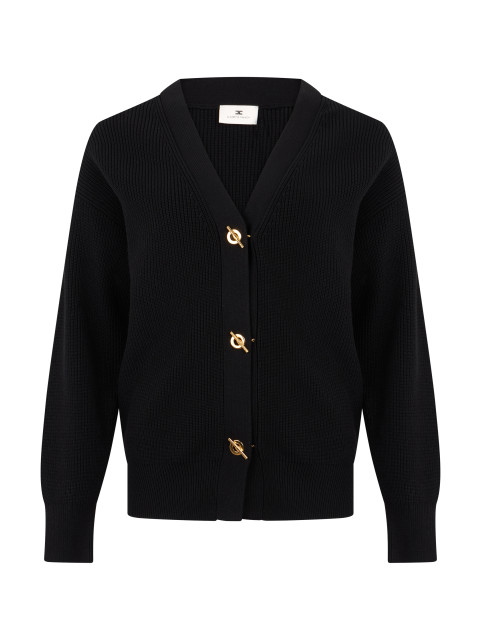 Cardigan knitted with fasteners