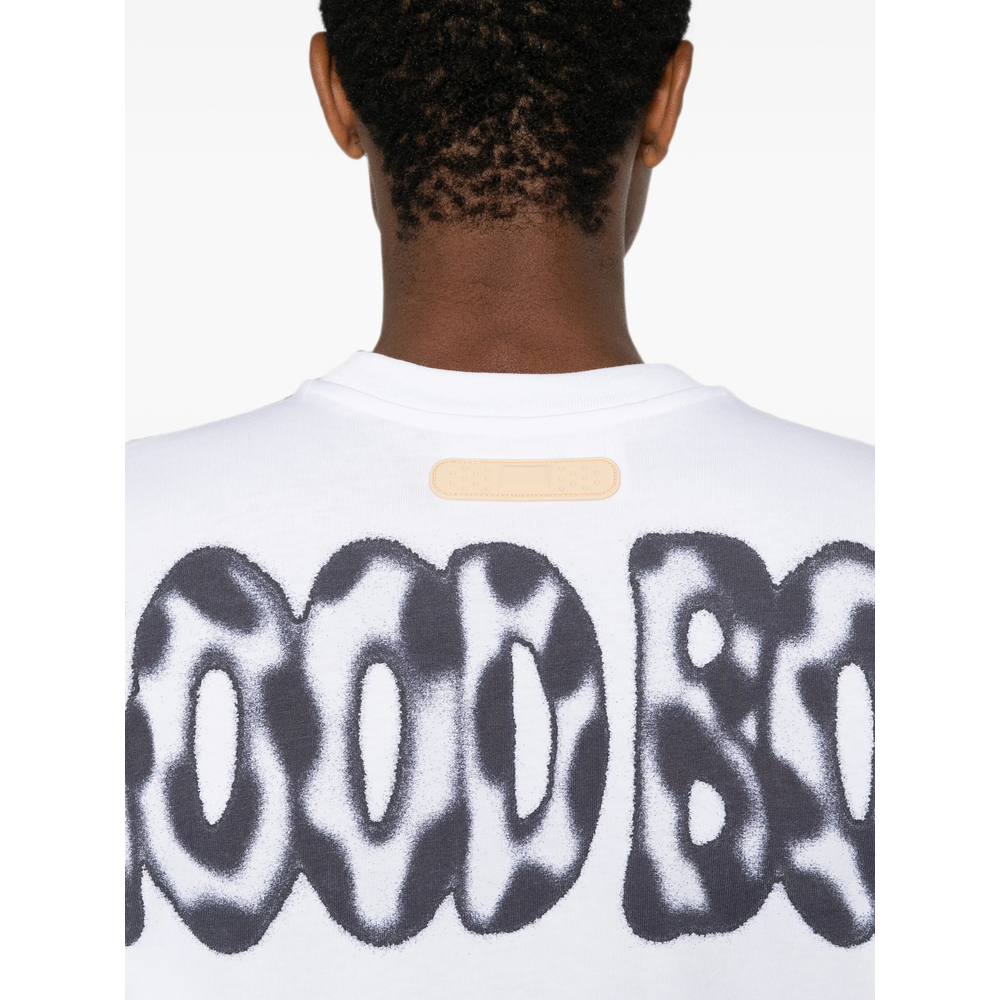 [PDF] T-shirts Short Sleeve FW26 DFM54047 TJ101GR01E WHITE