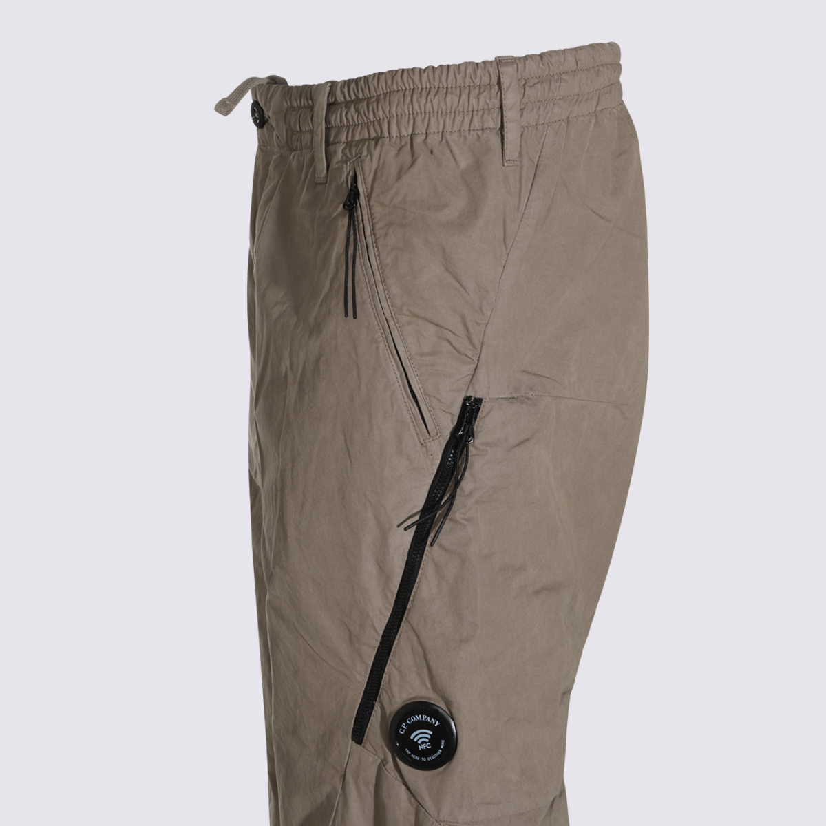 [C.P. Company] Trousers FW26 21CMPA059A110324G356