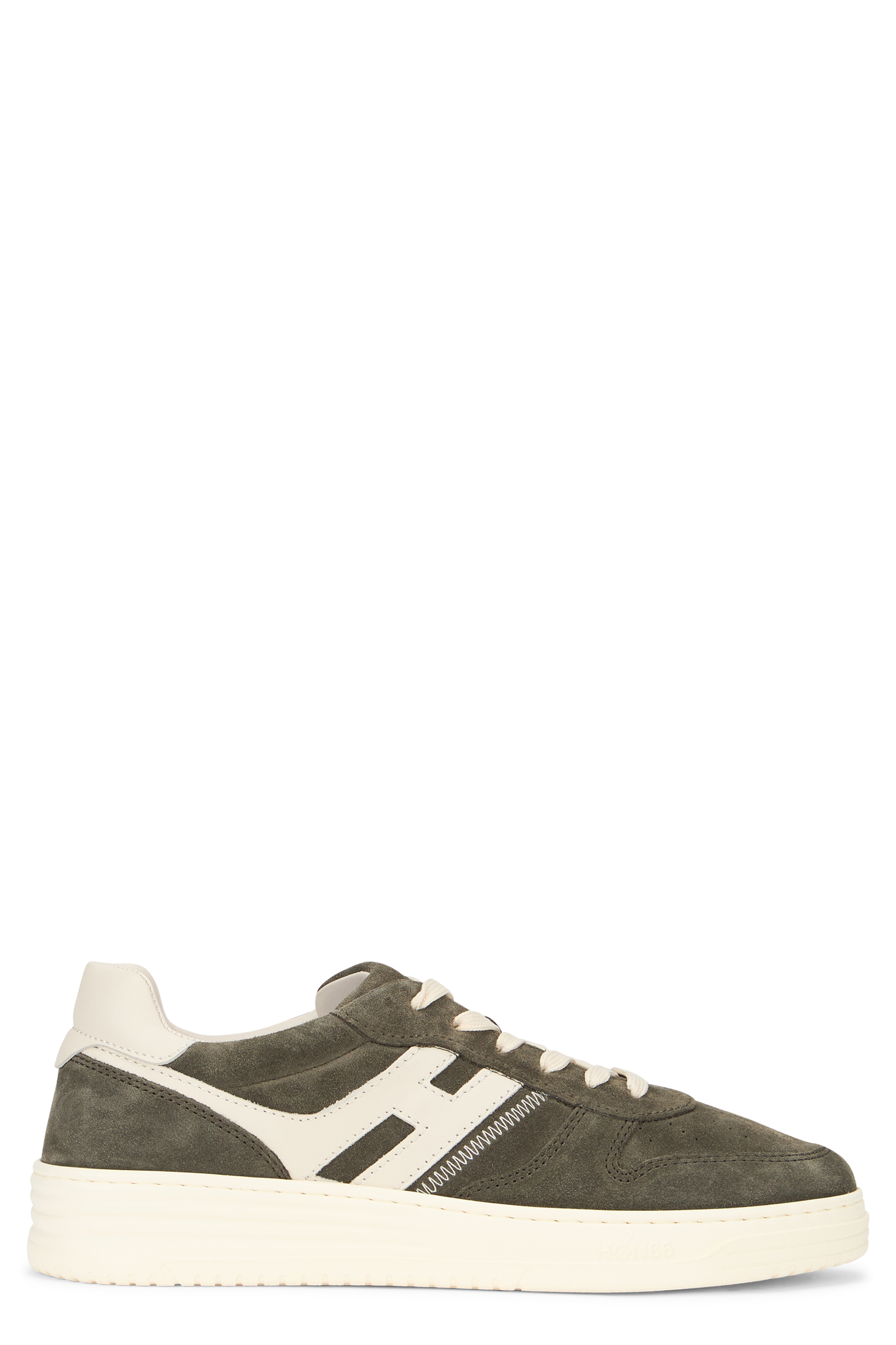 Green sports sneakers with durable sole