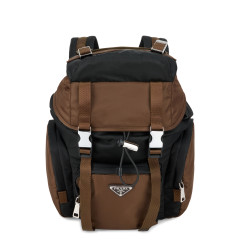 Backpack with logo plate and buckle